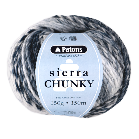 Ball of Patons Sierra Chunky yarn with label on a white background