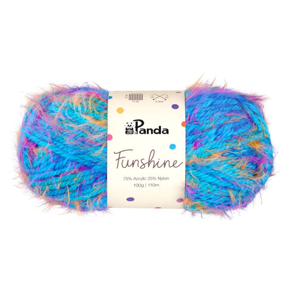 Multicolored yarn ball with Panda brand label on a white background Magic Blue with gold yellow and pink flecks