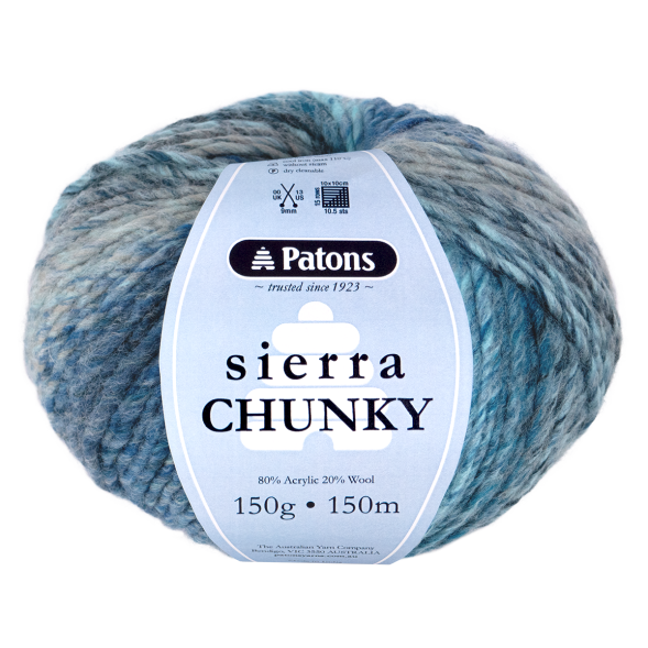 Ball of Patons Sierra Chunky yarn with label on a white background